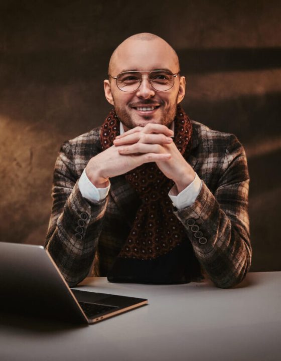 confident-european-handsome-businessman-sitting-in-2021-08-27-23-44-43-utc-e1697765457536.jpg